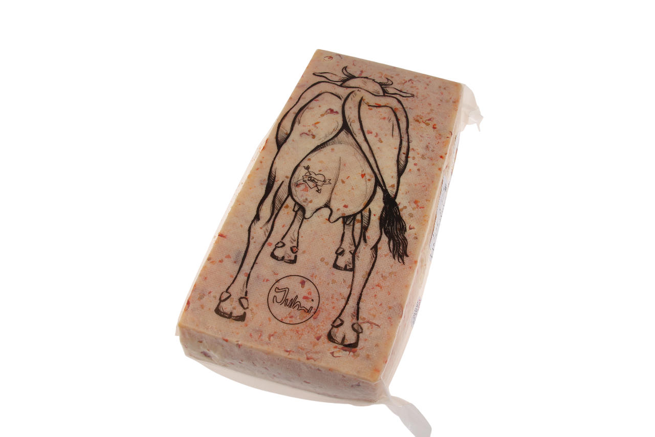 Handwerklich hergestellter Schweizer Rohmilchkäse mit Chili – würzig, feurig und ideal für Raclette-Abende