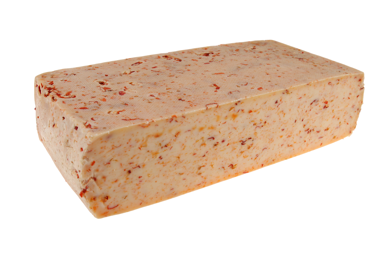 Raclettekäse mit roter Chili aus der Schweiz, aus naturbelassener Rohmilch gefertigt, mit intensiv würzigem Aroma